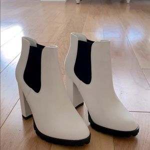 Heeled white booties never worn